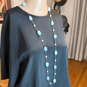 20” silver chain with beads ..... beads are glass or stone.